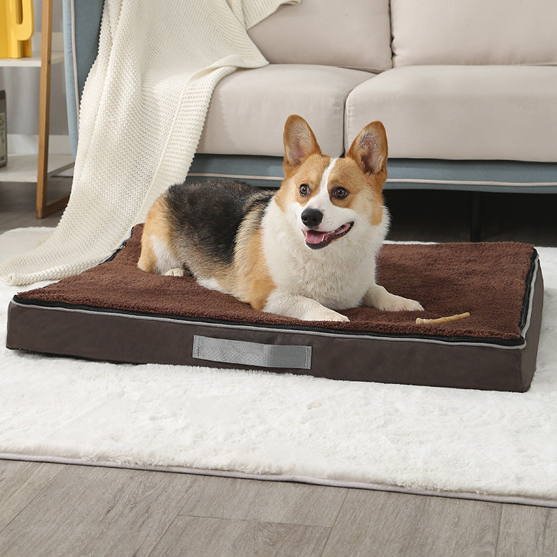 Corgi on a brown memory foam dog mattress